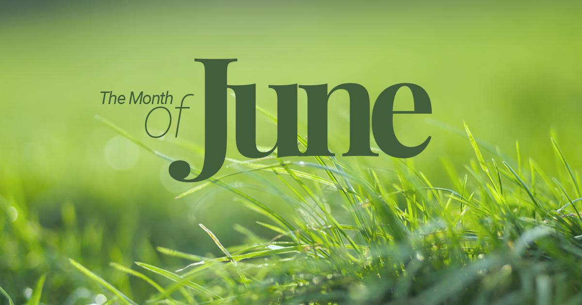 a green grass field with the words the month of june.