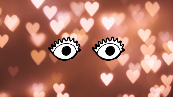 a couple of eyes with hearts in the background.